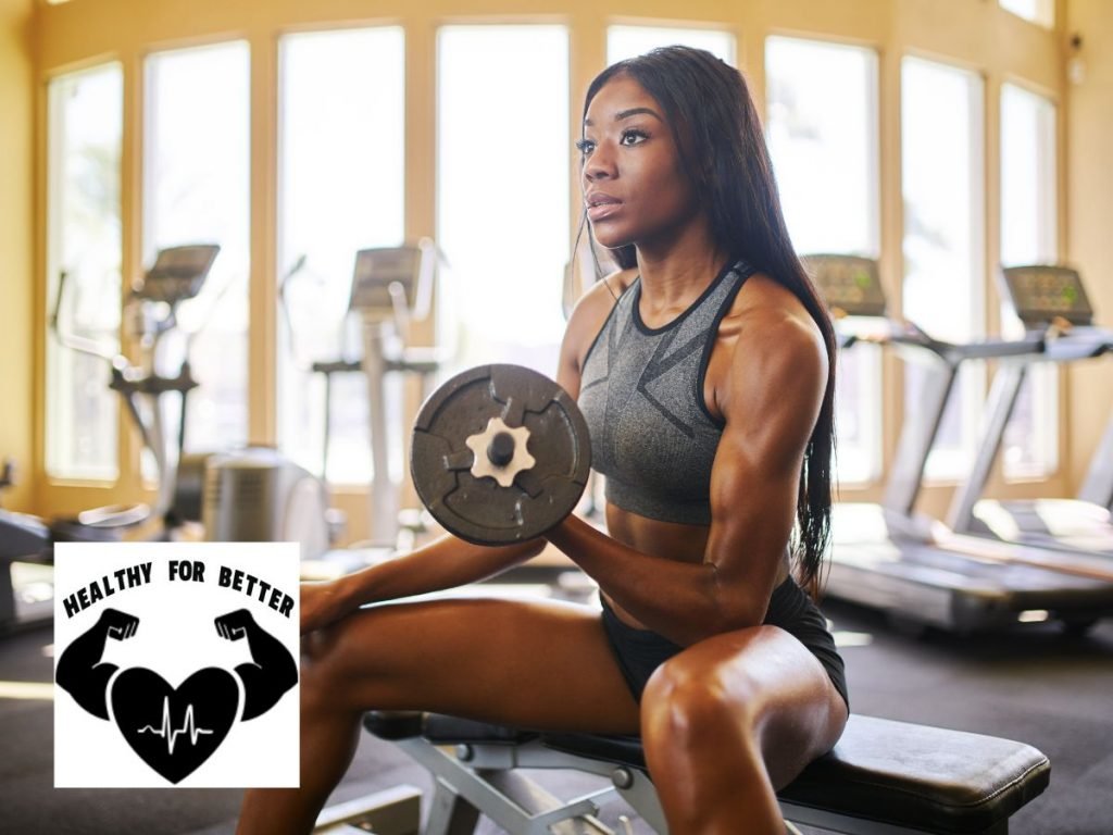 girl lifting heavy dumbbell 