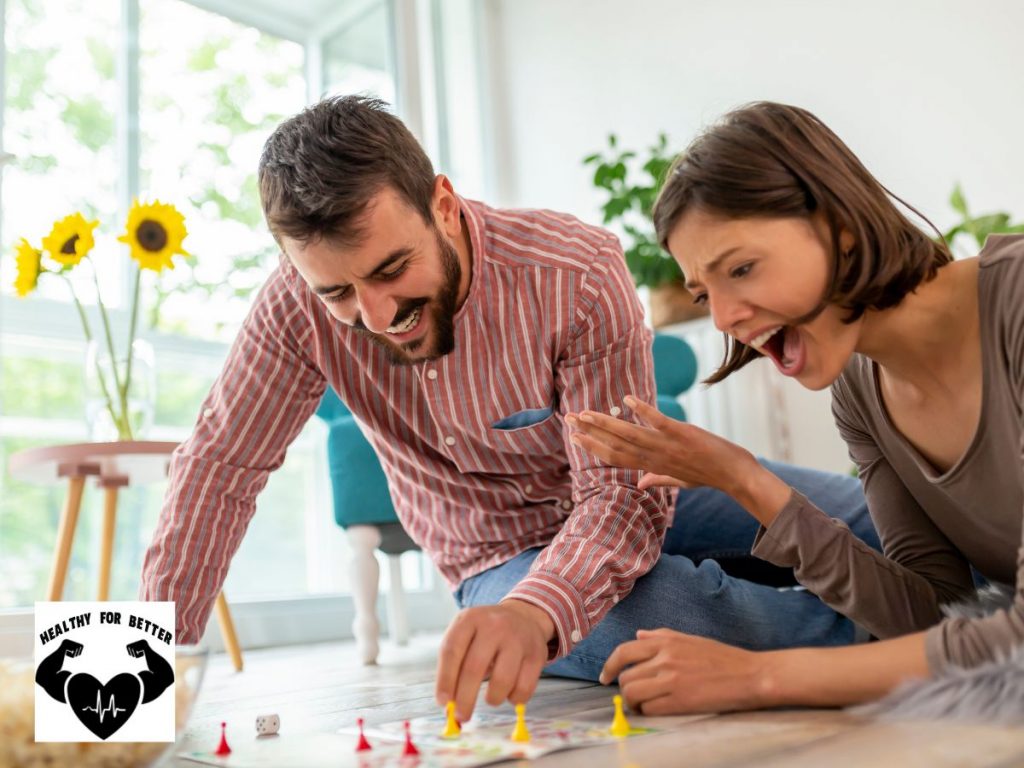 couple playing board game